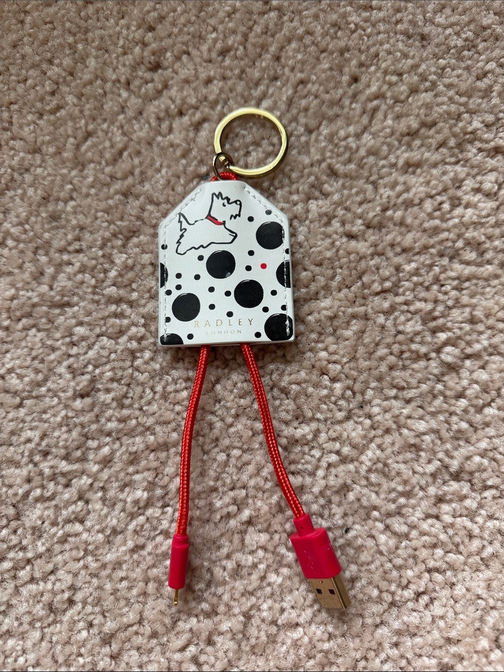 RADLEY LONDON White & Black Polka Dot Dog Tag Keychain Charger with Red Cable